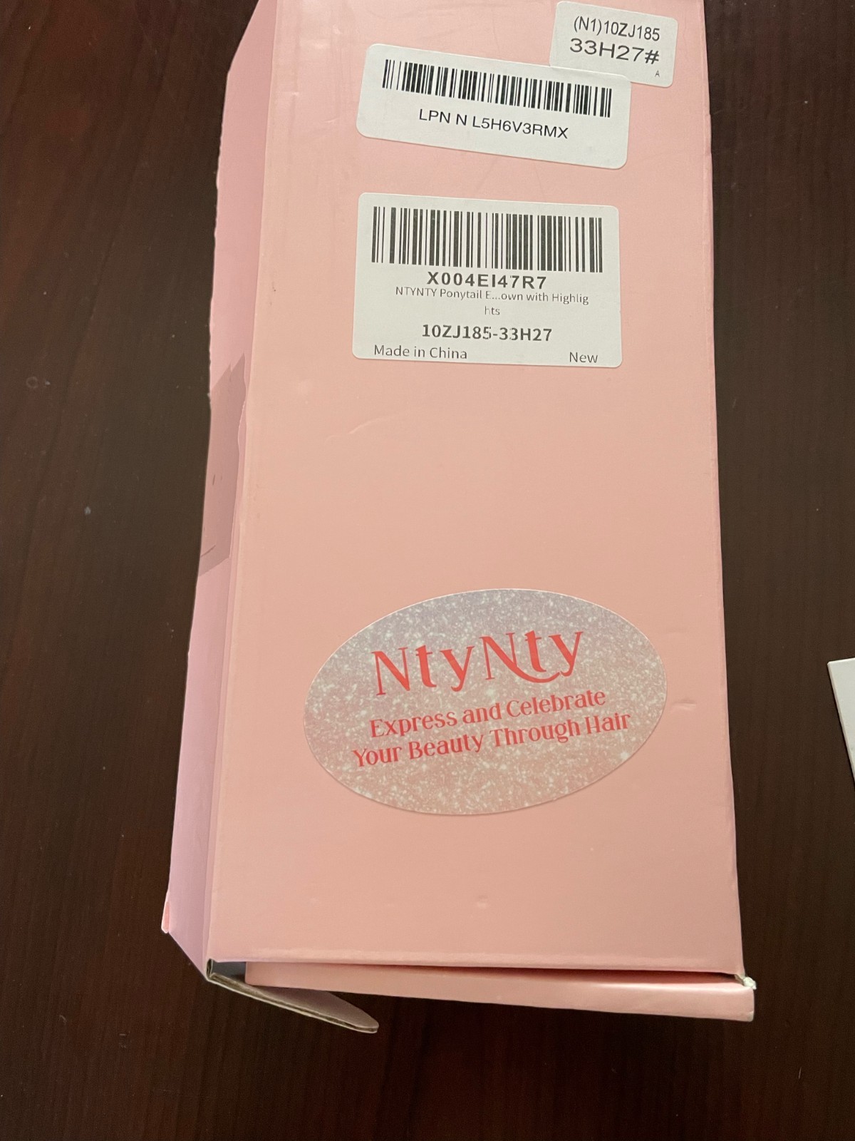 Ponytail extension w/comb brown with lighter highlights new in box NtyNty