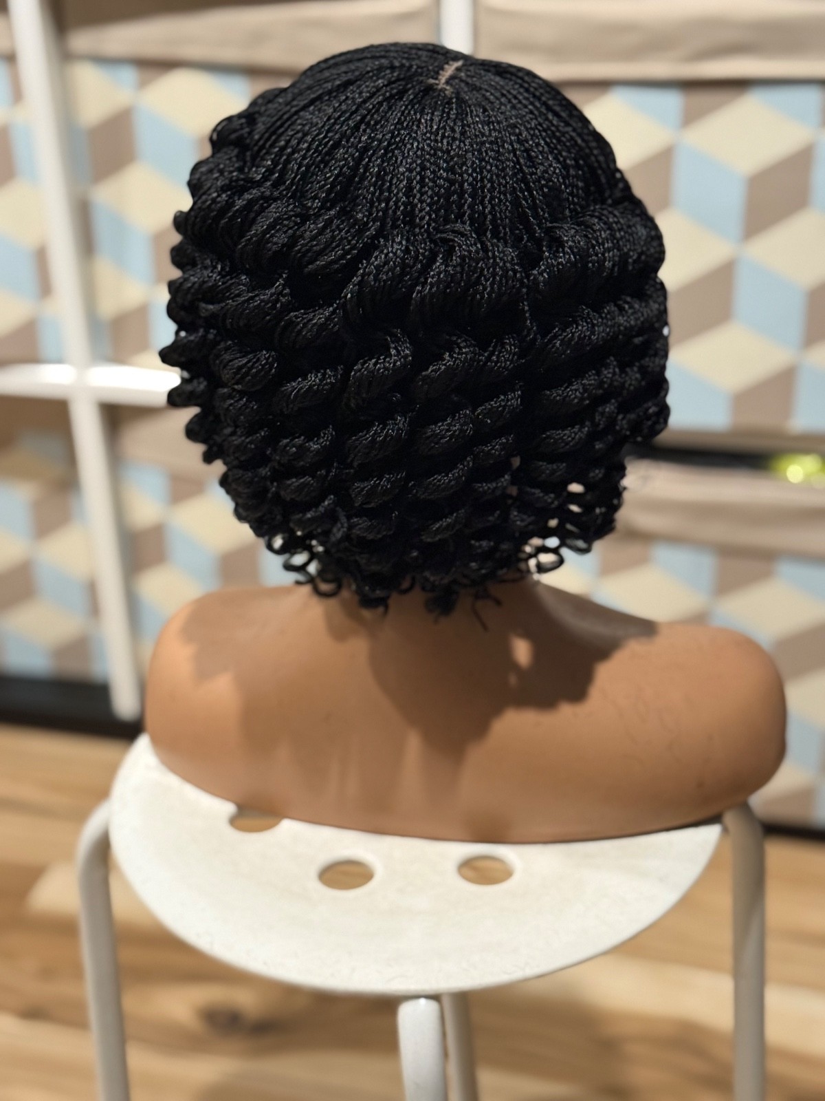 Micro twist braided wig. It is made on a closure