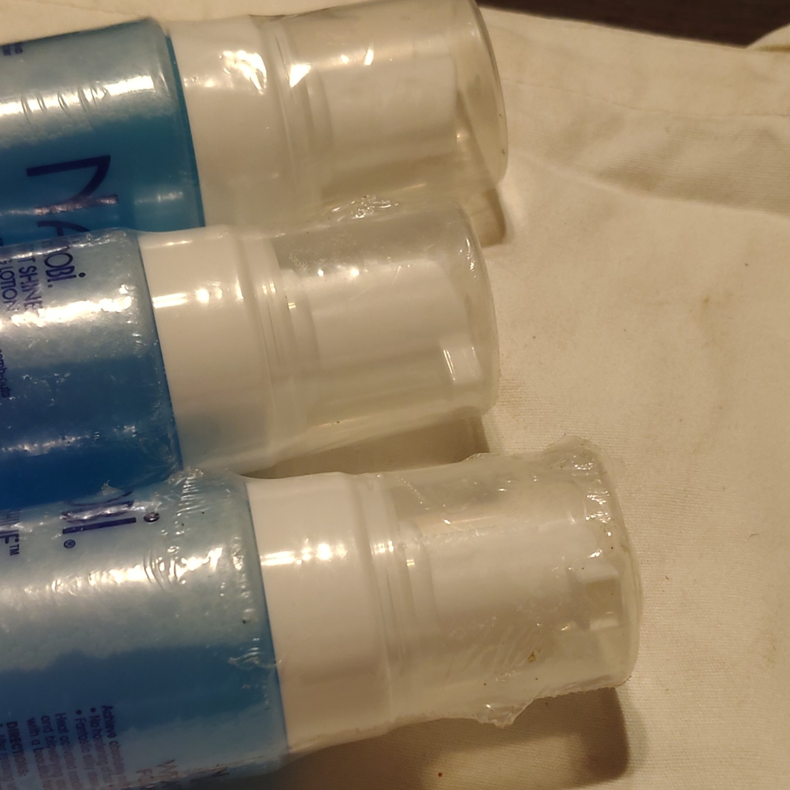 Nairobi wrapp-it shine loaming lotion 3 bottles 8oz each