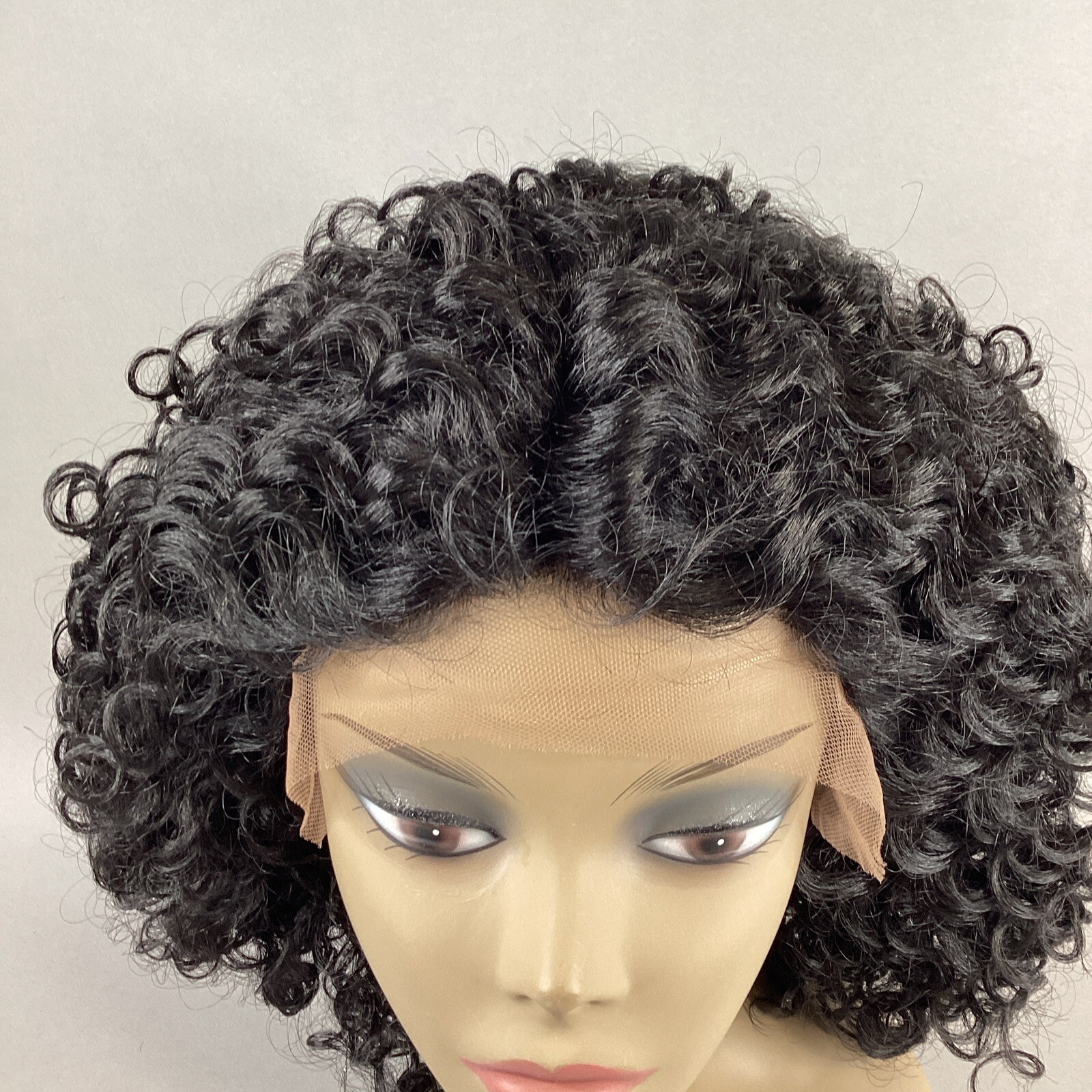 Shay Short Curly #1B Off Black Synthetic Lace Front Wig by Outre Lace Part