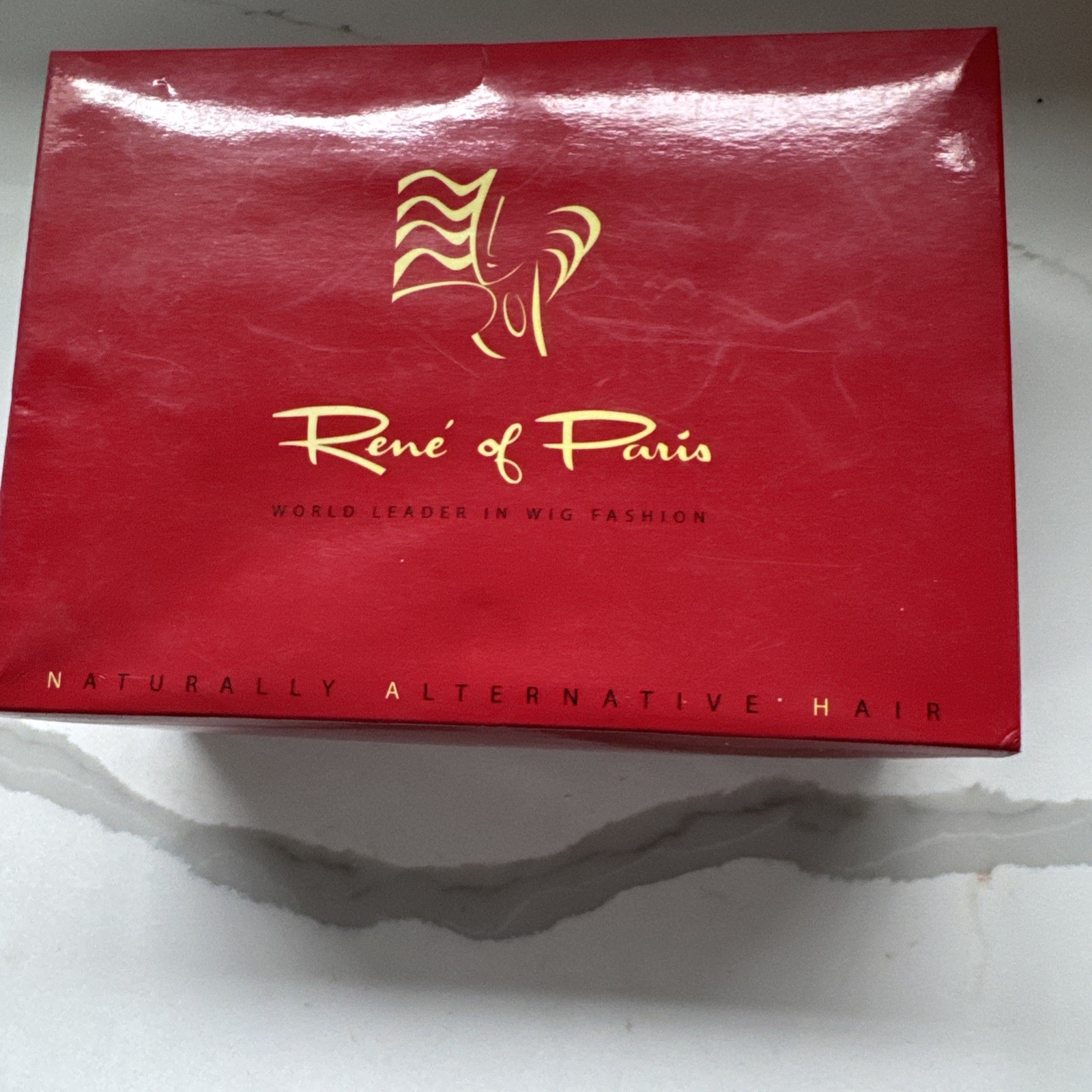 Rene of Paris Synthetic Wig Short Bob with Bangs Blonde Highlighted