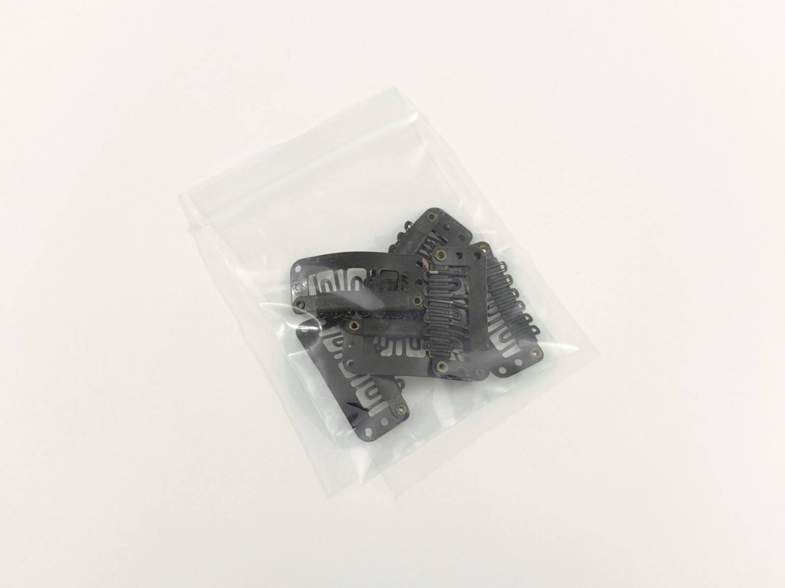 Hair Extension Clips with 3 Track Weft Holes in Black Set of 7