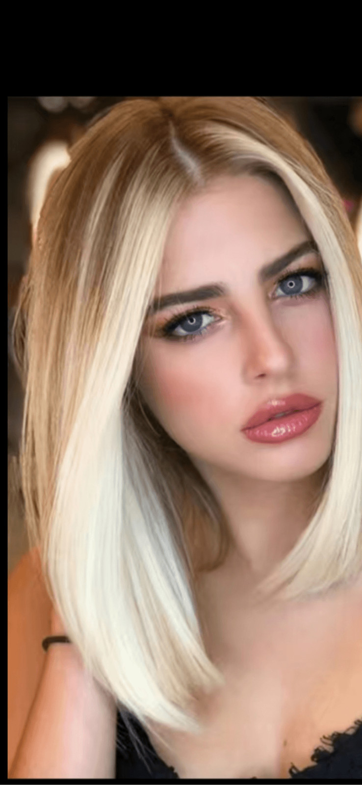 Blonde and beige highlighted 16 inch Shoulder length straight bob with middle pa