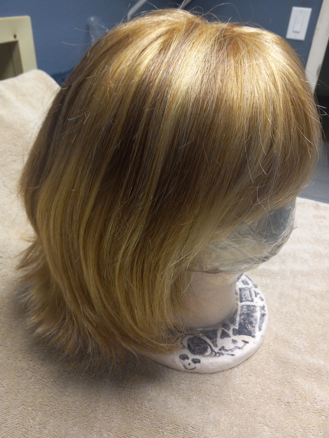 Raquel Welch Synthetic Wig. Color: Light Brown With Light Highlights