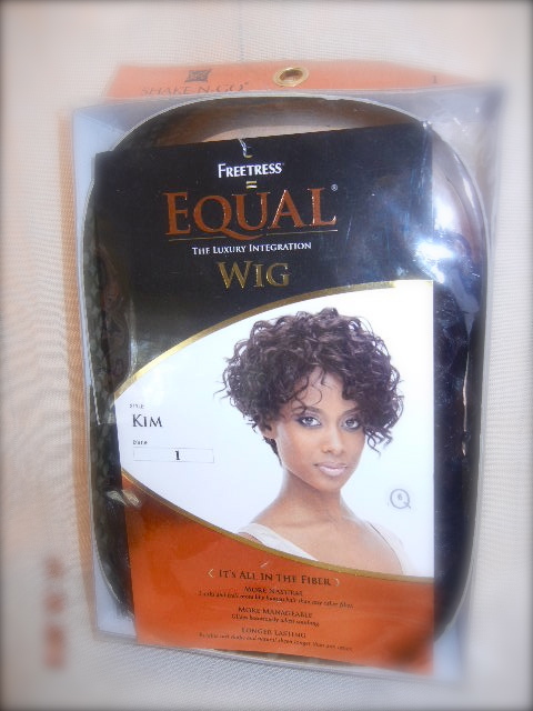 Shake-n-go Freetress EQUAL Synthetic Wig NAME: KIM short unbalanced Curly style