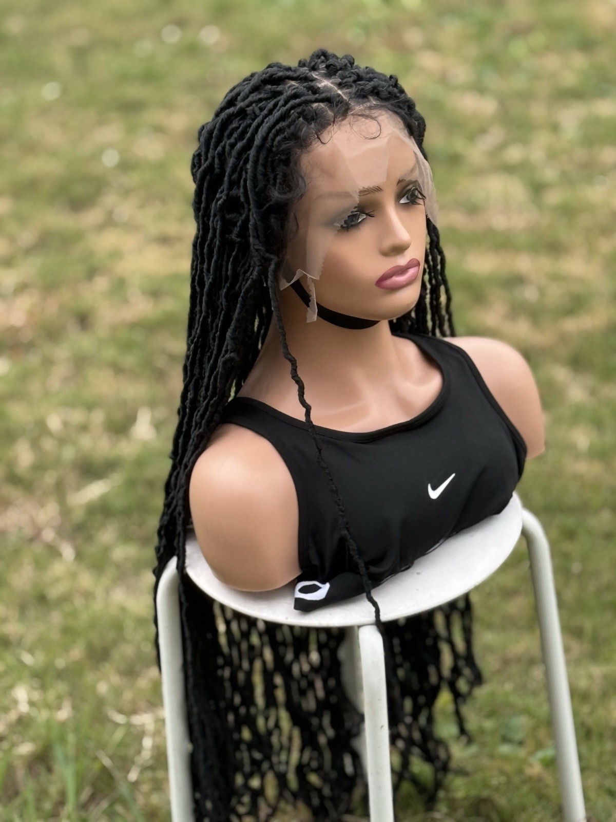 braided handmade faux locs. Color is black. Length Is 26inches. Full Lace Wig