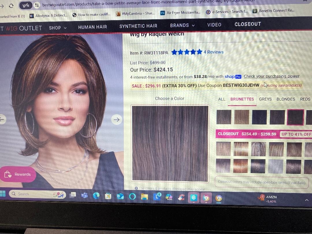 Raquel Welch Take A Bow Chin Length Layered Wig With Hand Tied Base by Hairuwear
