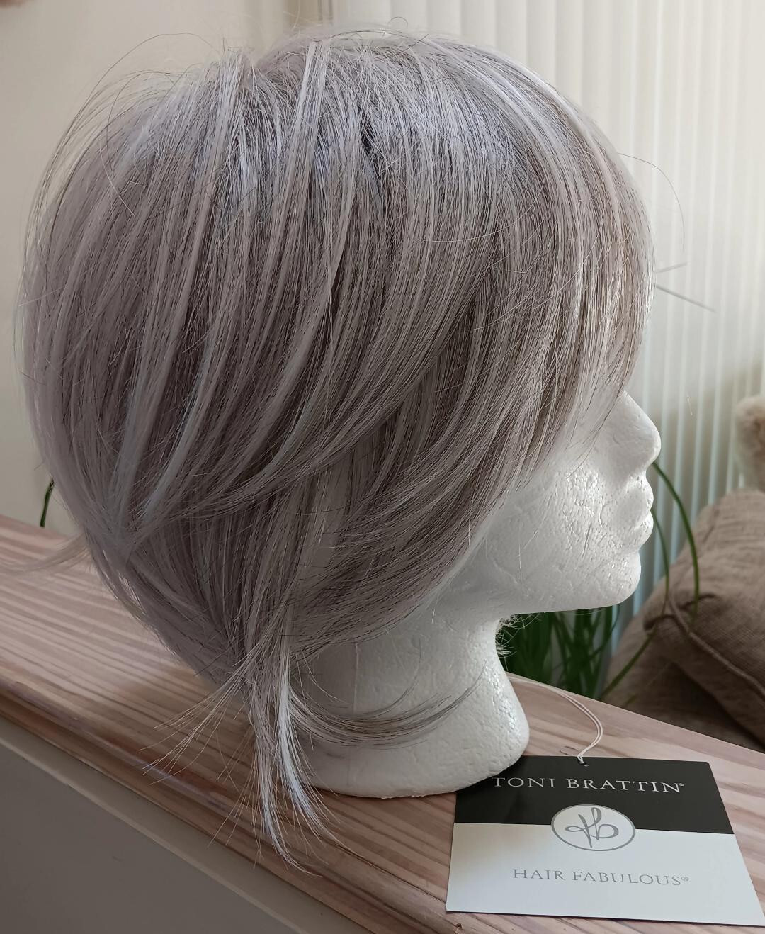 Toni Brattin Flirtatious Wig – Casual Bang with Trendy Cut in Light Gray-Sz PLUS