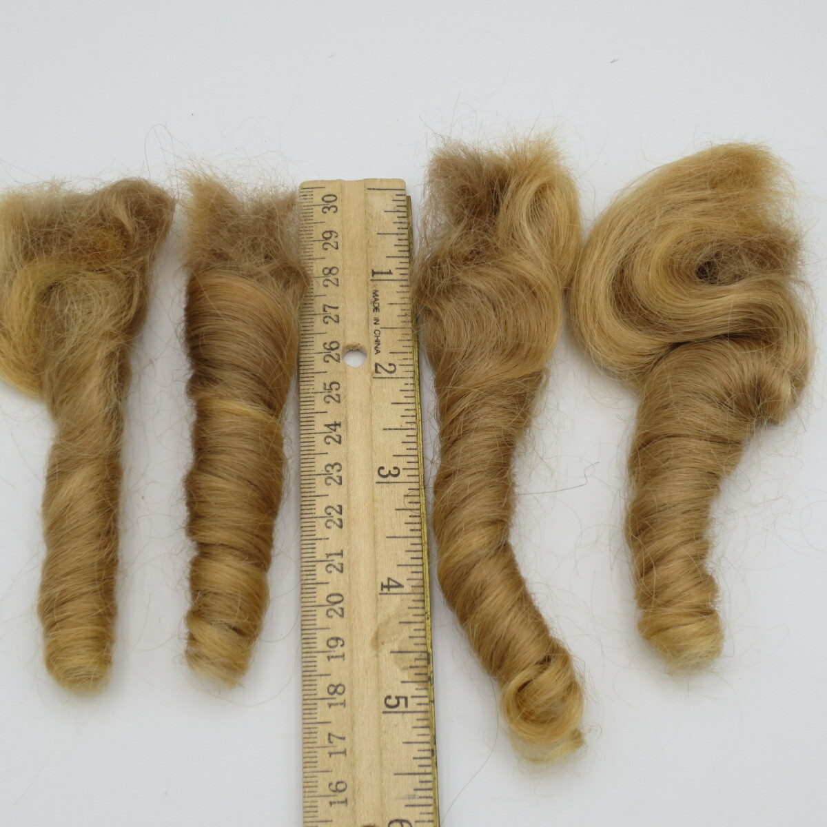 REAL CUT VIRGIN HUMAN HAIR – DIRTY BLONDE SPIRAL CURLS – SET OF 4 (5″ long)