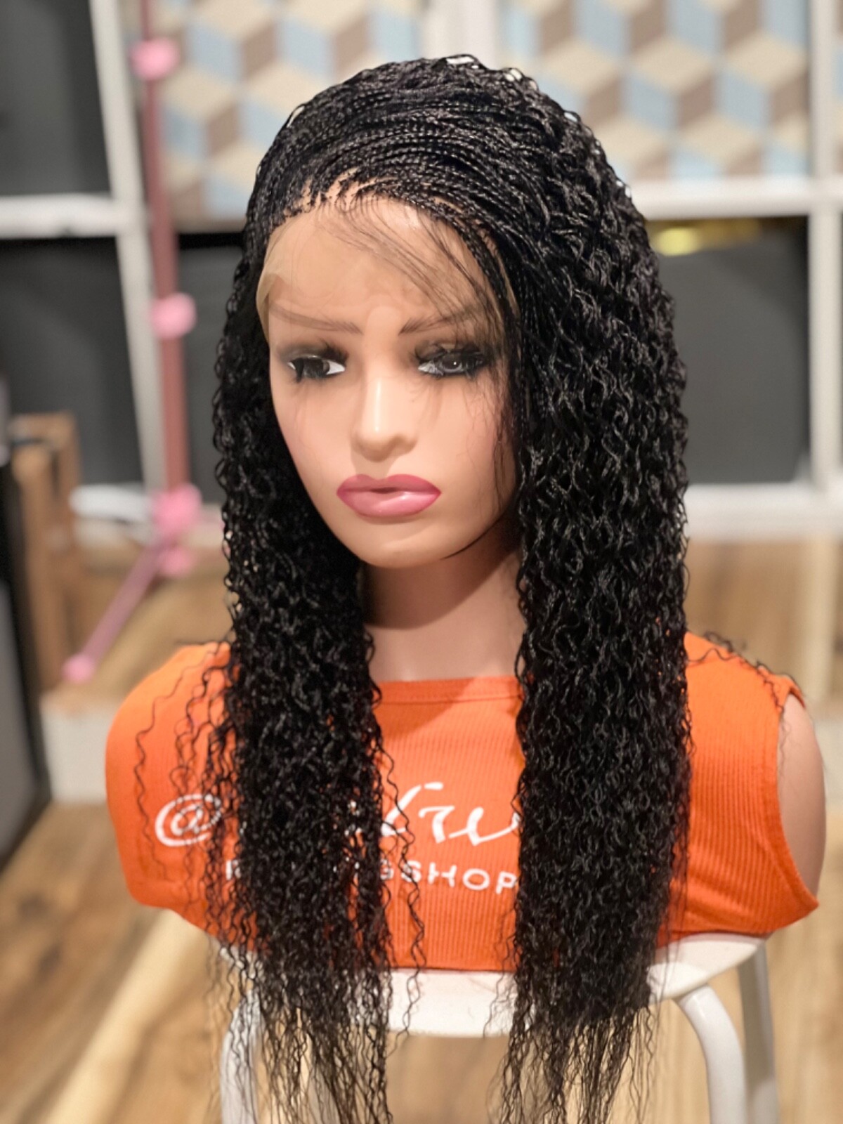 Braided water wave wig made on a full lace wig.length is 18”long..color black.