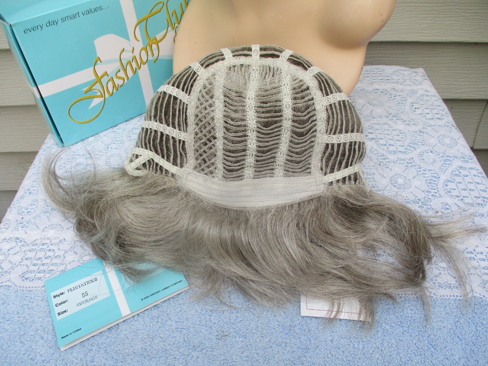 The Wig Company Wig FLIRTATIOUS Color 56 GRAY Classic Mid Length Style