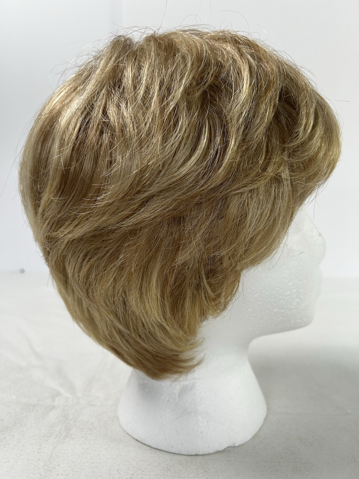 Raquel Welch Signature Collection Synthetic Wig Light Brown Blond Highlights