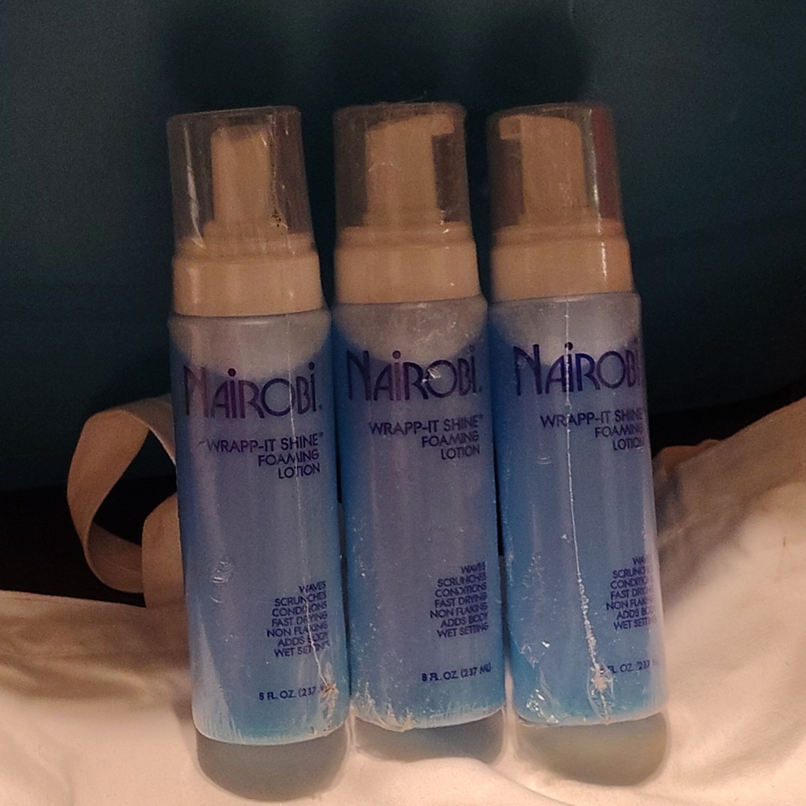Nairobi wrapp-it shine loaming lotion 3 bottles 8oz each