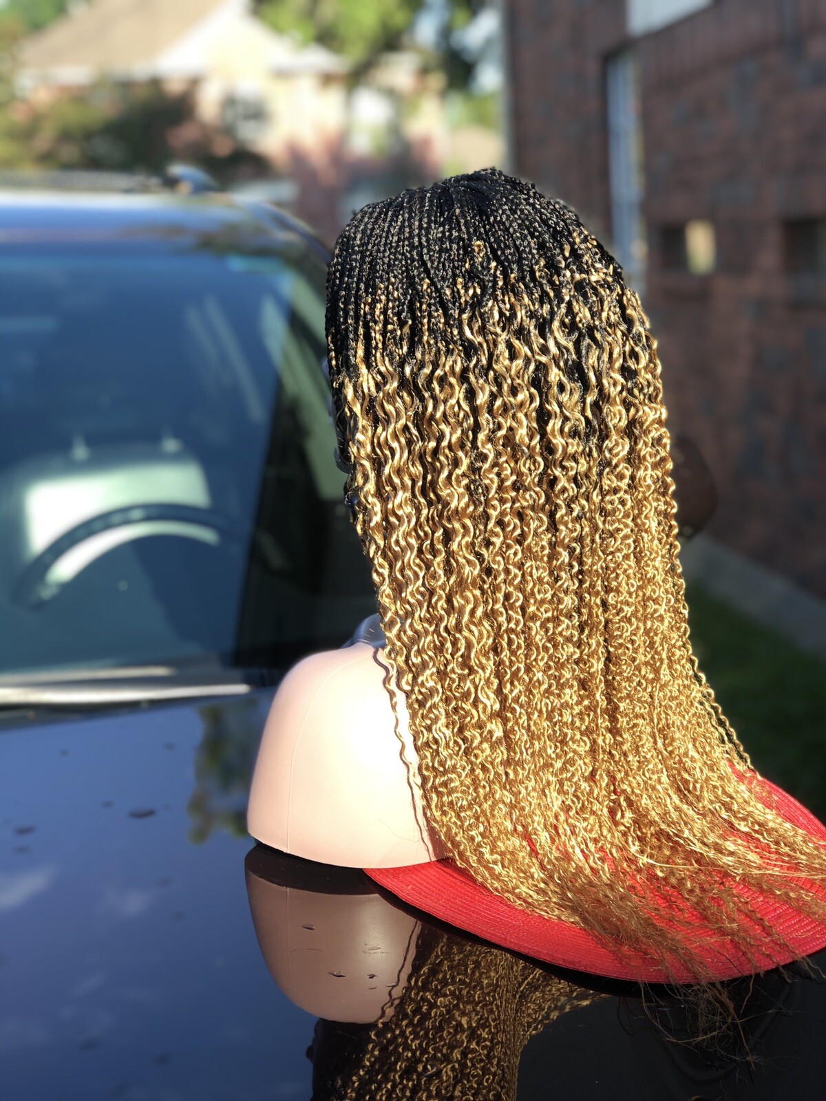 Braided Wavy Wig .. Custom made.color Is Gold & Black.The Length Is 22inches.