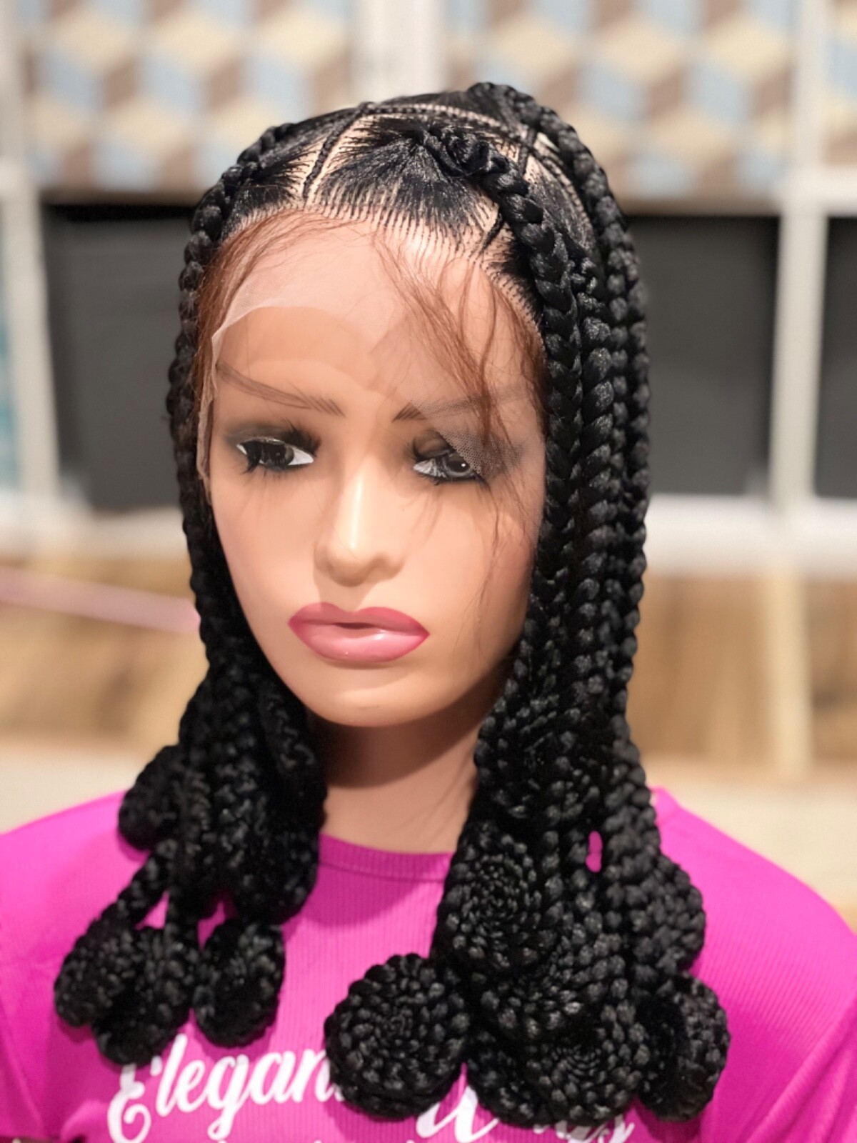 Knotless braided wig, made on a full lace wig. Length Is 16”long.