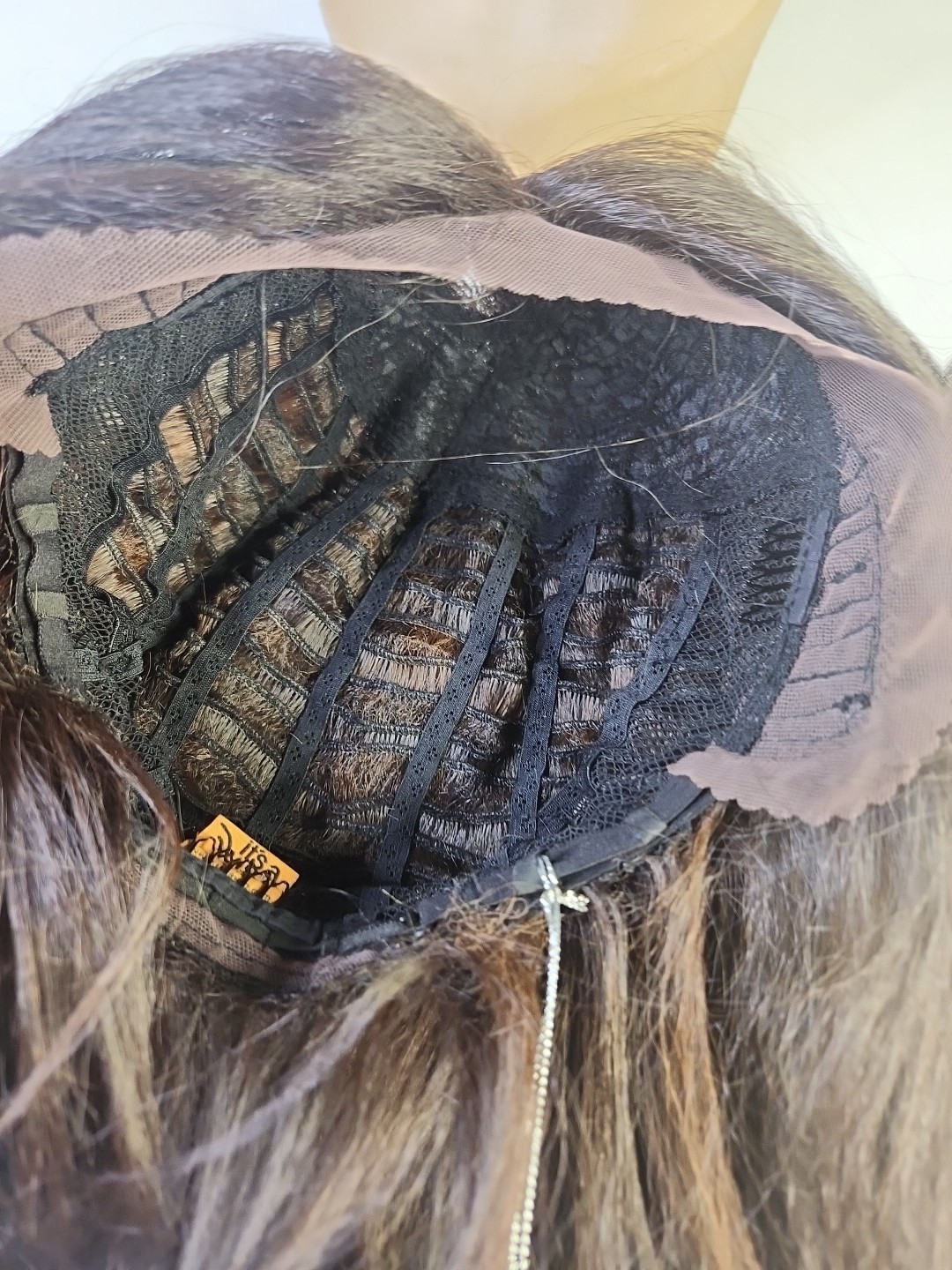 It’s a wig Swiss Lace Front Style Swiss Color P4/30 Medium Brown Wig .