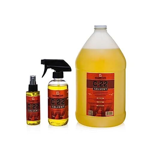 C 22 Adhesive Solvent. Oil base 12 oz. spray glue wig cleaner