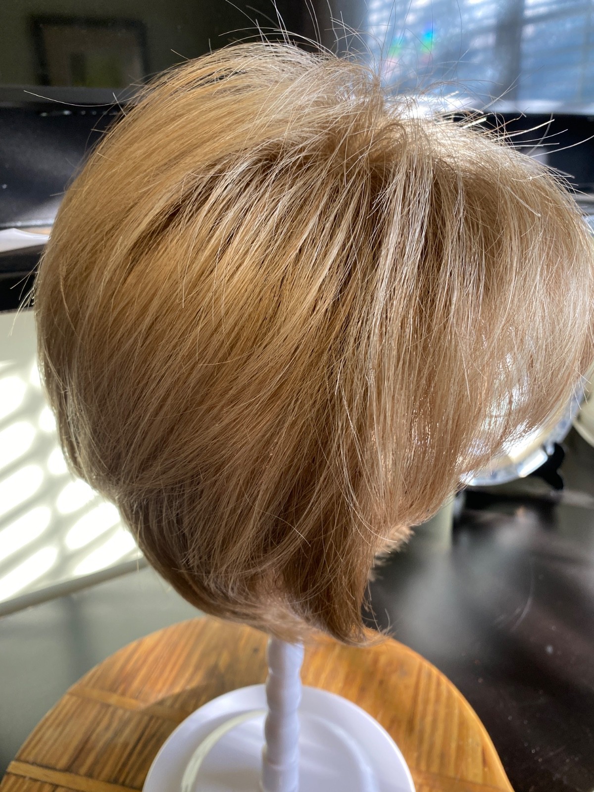 Rene of Paris: Wig – Ash Blond. Comes with stand brush and wig shampoo. (Boxed)