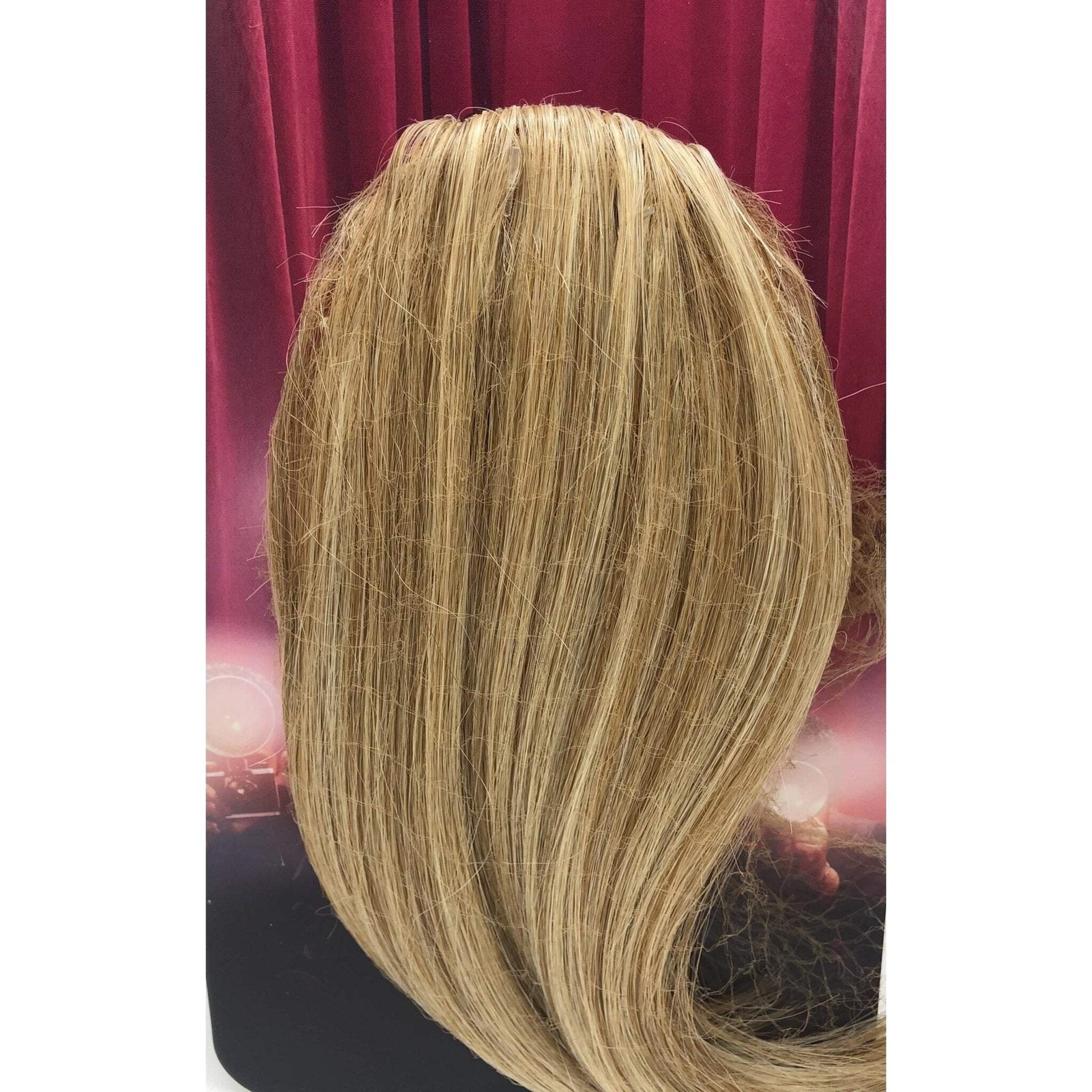 E! SWEPT AWAY SIDE BANG – by Hairdo