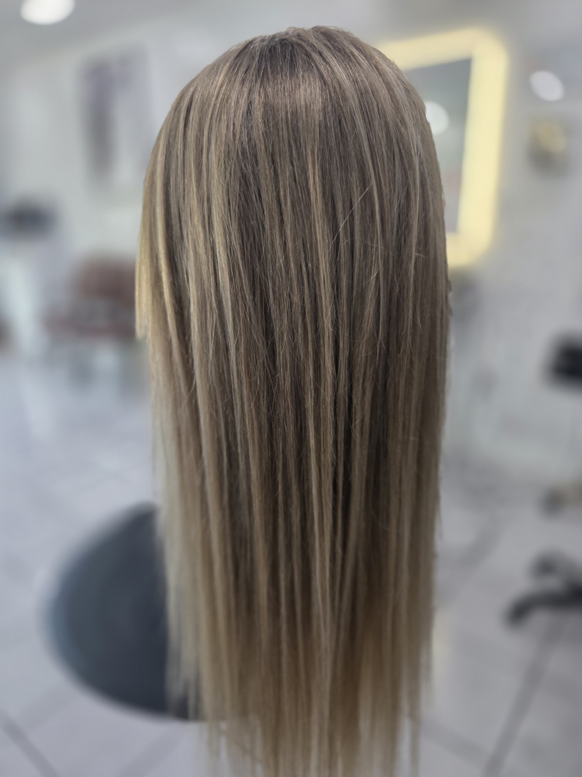 30-inch custom-colored wig crafted from virgin human hair, designed to emulate