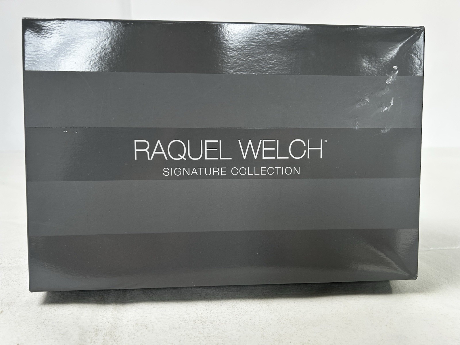 Raquel Welch Signature Collection Synthetic Wig Light Brown Blond Highlights