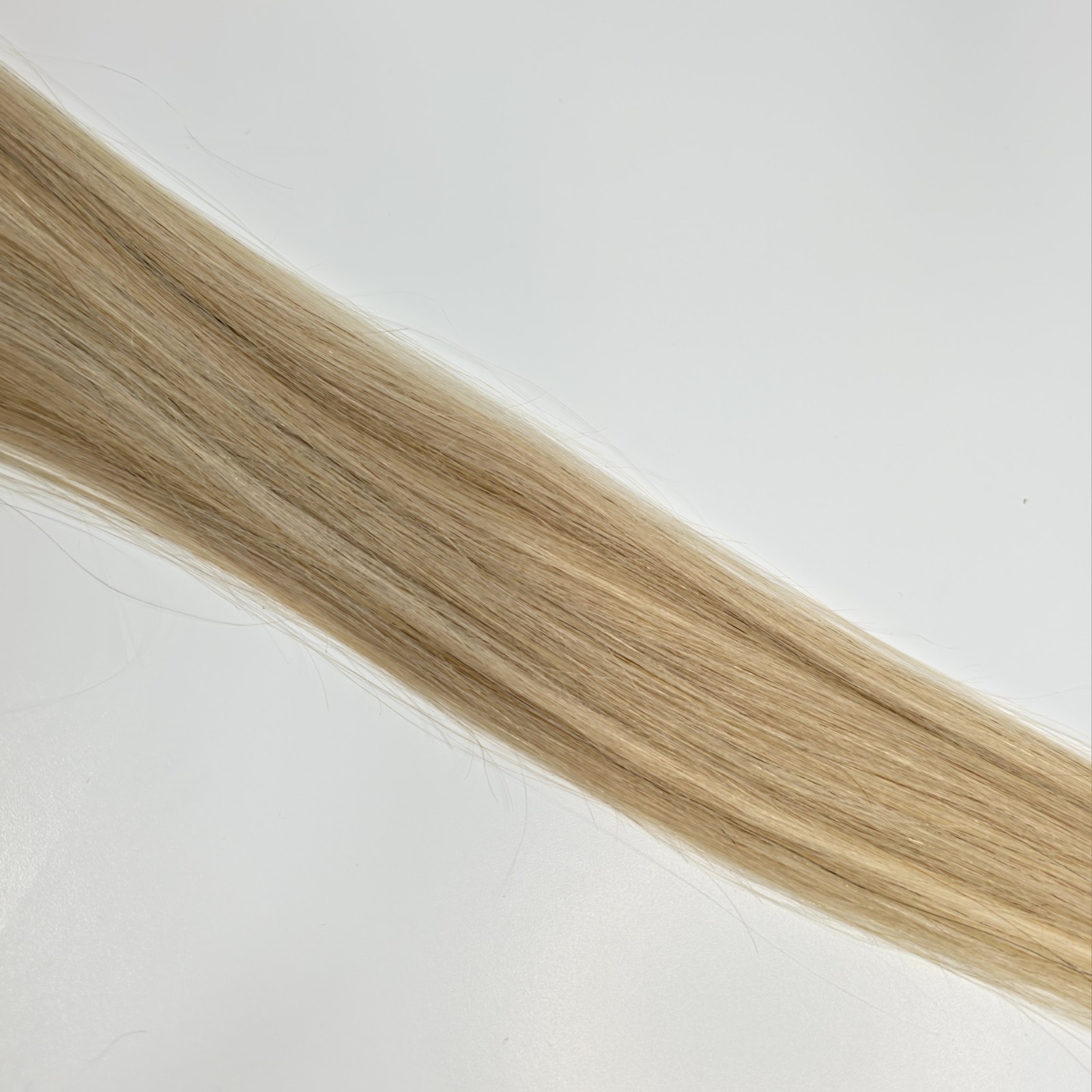 Glam Seamless 16″ Human Hair Clip-In Extension 3″ Wide Single Weft Blonde 23/60
