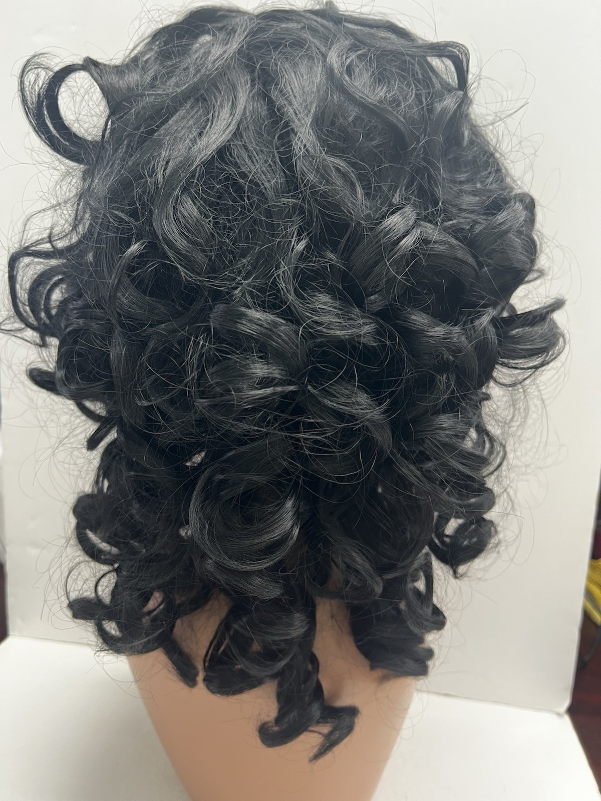 Synthetic Black Curly Hair. New Without Box and Never Been Worn. See Photos.