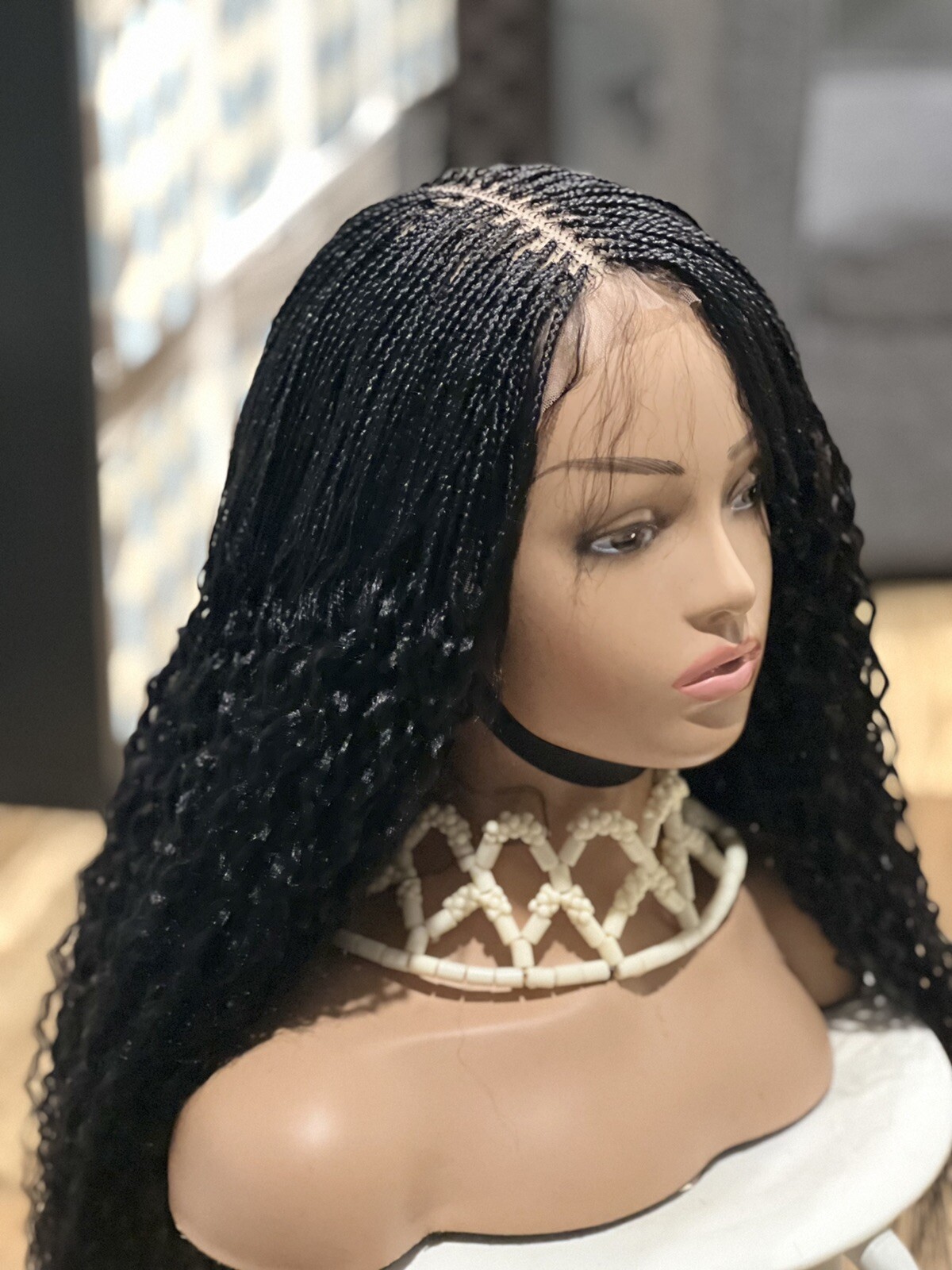 Braided Water Wave Wig. Made on a full lace wig.length is 24inches Long.black.
