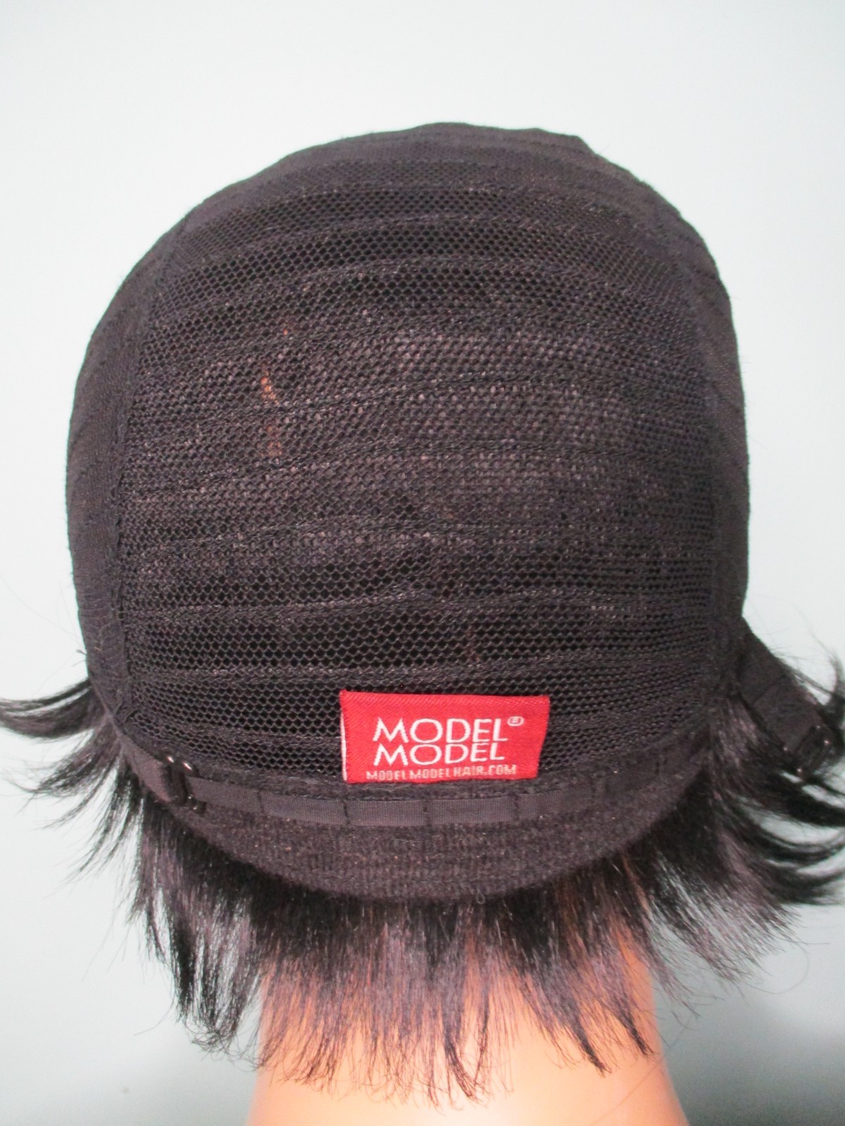 2″ – 8″ black asymmetrical disconnected pixie WIG by MODEL MODEL