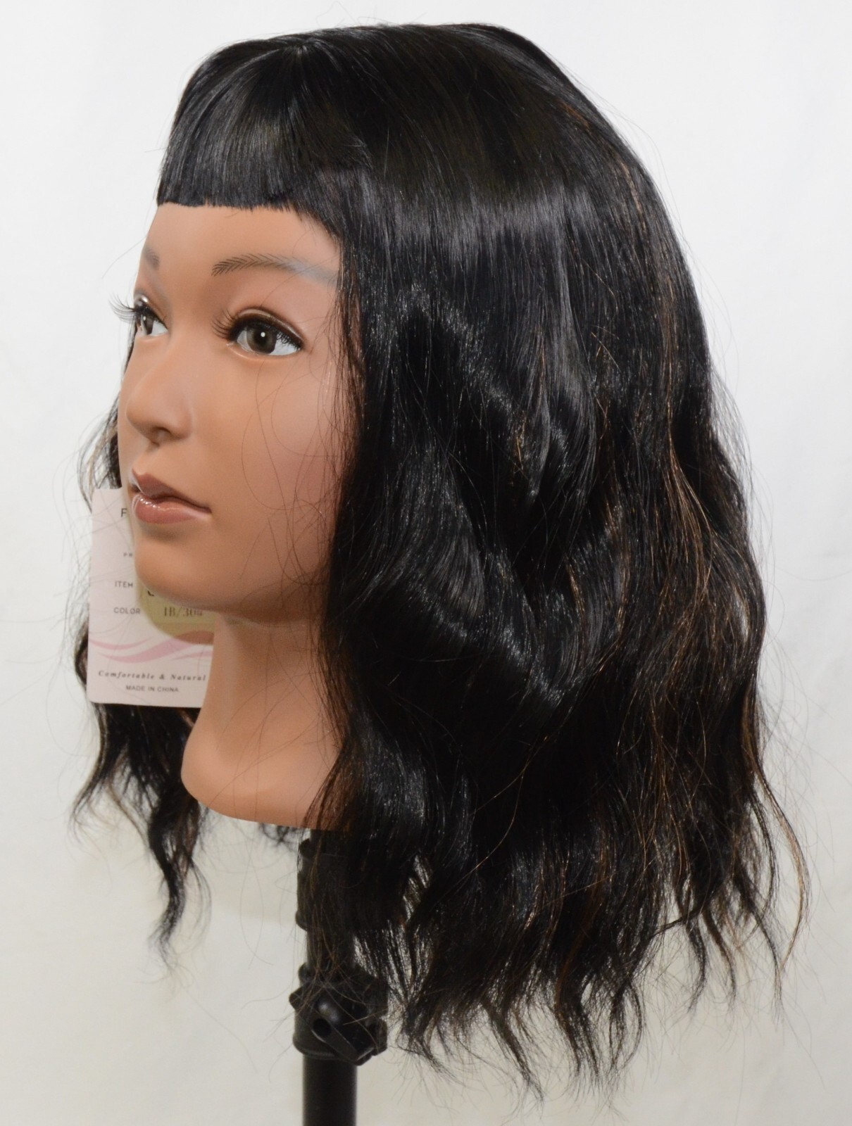 Black Wavy Wig with Copper Blonde Highlights and Short Bangs – Shoulder Length