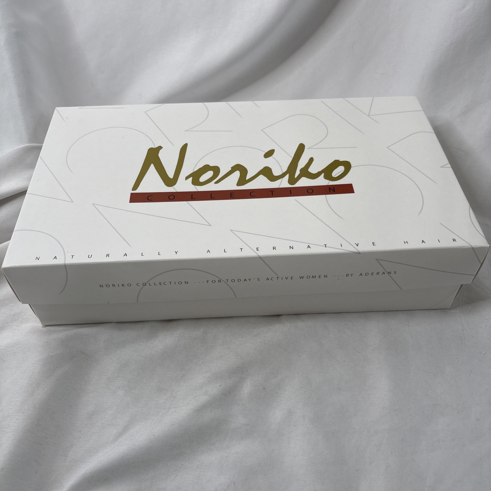 NORIKO JOLIE Creamy Blond Modern Bob Layered With Texture And Volume Wig