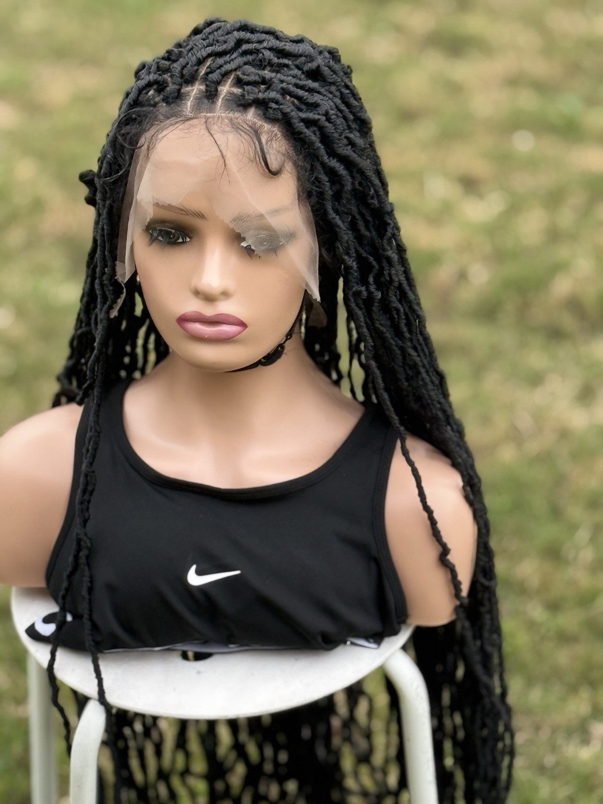 braided handmade faux locs. Color is black. Length Is 26inches. Full Lace Wig