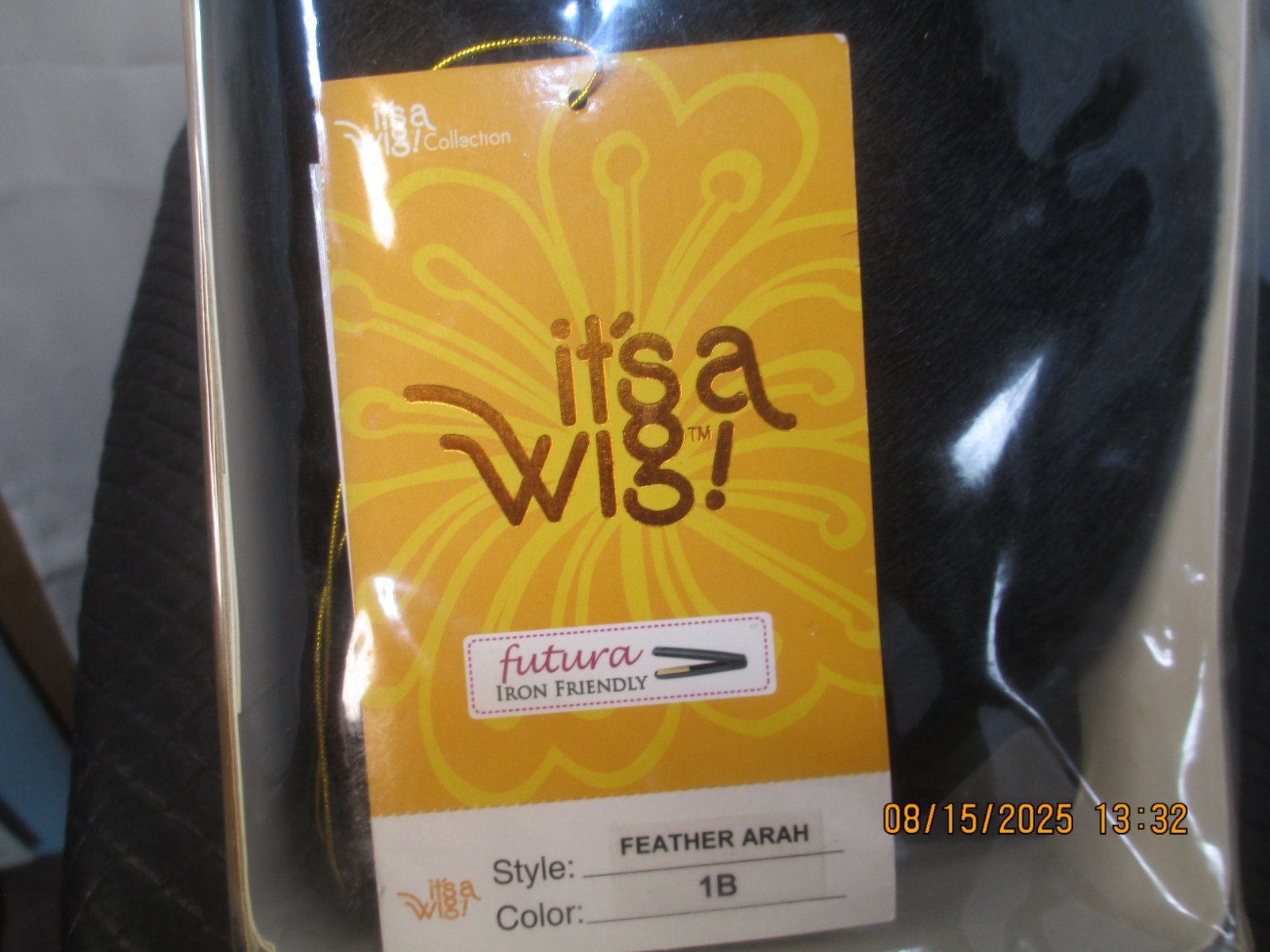 its a wig short sleek w/bangs black color 1B no styling heat safe cute NEW