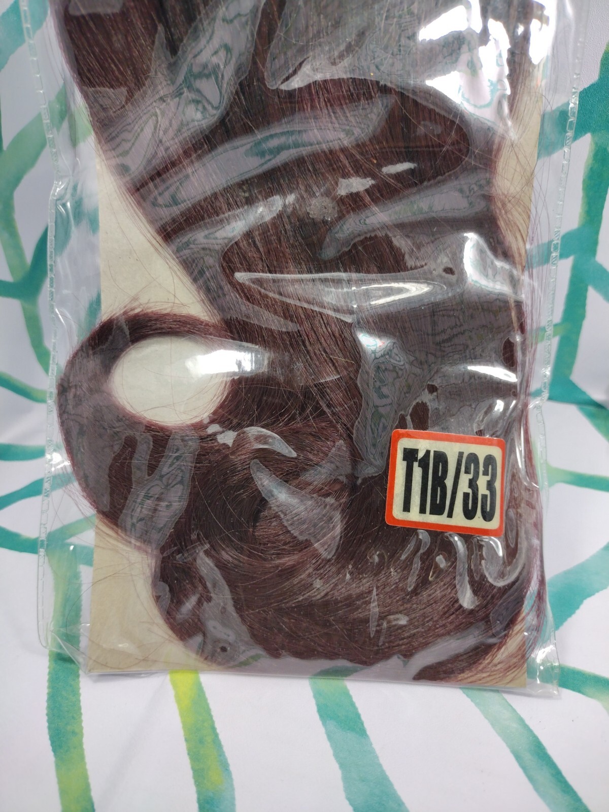 NEXT Kanekalon Fiber – 100% Tangle Free. Style S.Yaki Pony2 Color T1B/33