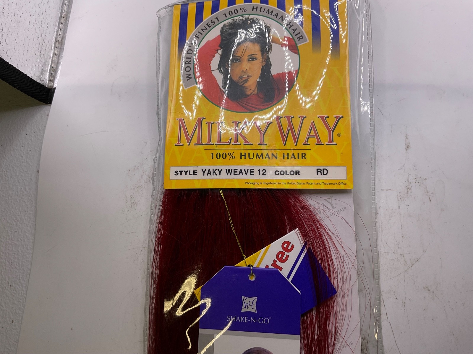 Shake-N-Go Milky Way 100% Human Hair Yaky Weave Length: 12″ Color: Red