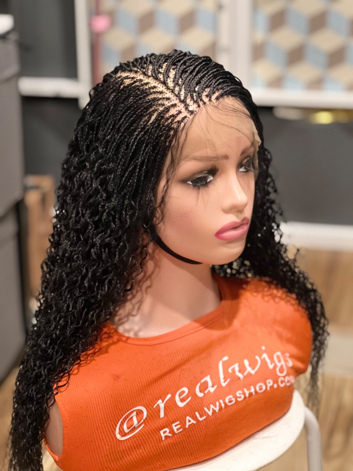 Braided water wave wig made on a full lace wig.length is 18”long..color black.